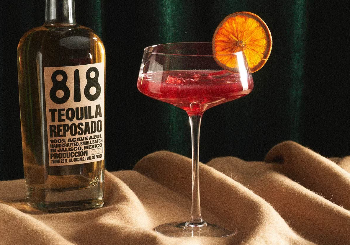 818 Pomegranate Date Margarita cocktail in a coupe glass